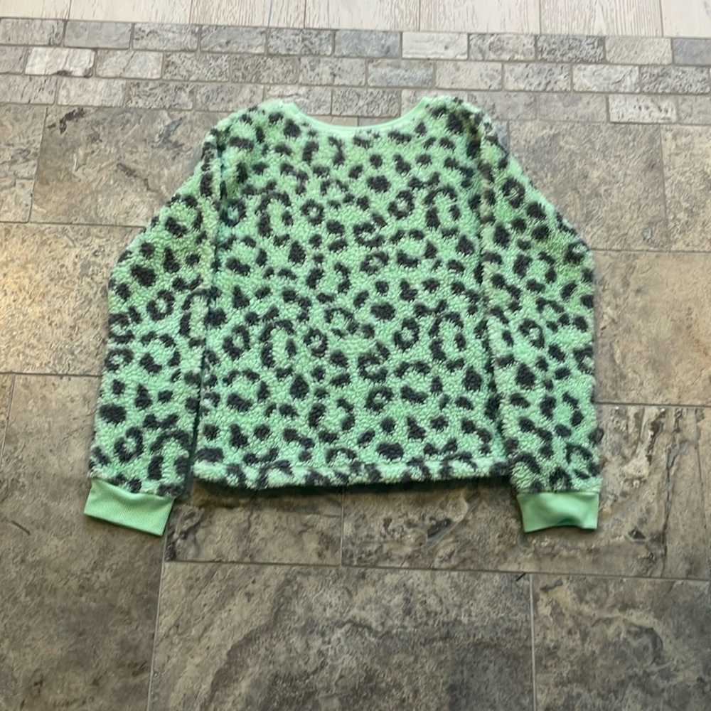 A cotton comfy cheetah print sweater.